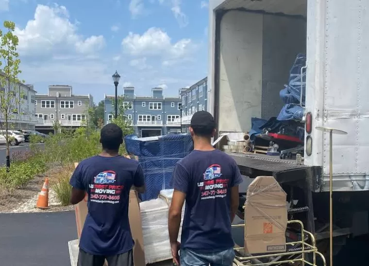 Professional movers packing a home